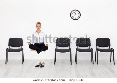 young woman hovers while meditating for job interview